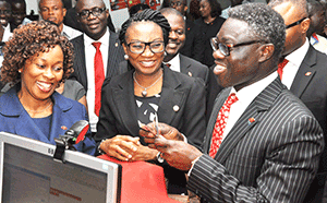 Right to left, front row: Oduoza, Okusanya, and UBA Divisional Head (Retail Products), Olumide Osunyomi, at the launch.