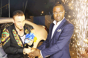 Achu (left) being congratulated by Adodo.