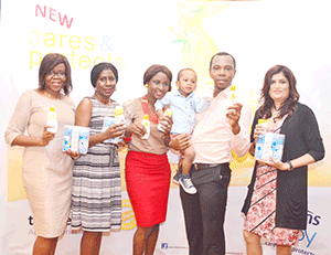 From left: PZ Cussons Assistant Brand Manager (Baby & Beauty), Seun Ayeni; Bagshaw; winning family of Cussons Baby Moment 1 (mother, child, and father, Daniel Uwadia); and PZ Cussons Marketing Director (Family Care), Sandy Griffiths; at the launch in Lagos.