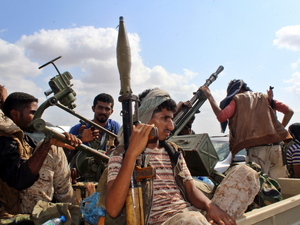 Soldiers loyal to the exiled Yemeni government are seen on a pick-up truck during an offensive against Houthis near the strategic Bab al-Mandab Strait, in the southern province of Lahj, Yemen on 01 October 2015. Forces loyal to Yemeni President Abd Rabu Mansour Hadi, backed by a Saudi-led military alliance, have regained the strategic Bab al-Mandab Strait from Iran-backed rebels. EPA/WAEL AL-QUBADY