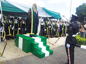 Federal High Court Chief Judge, Justice Ibrahim Auta, taking the salute during the parade by the Nigeria Police to mark the commencement of the new legal year.