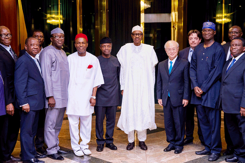 President Buhari, flanked by VP Yemi Osinbajo and Mr Y. Amano, DG, IAEA, among other cabinet ministers