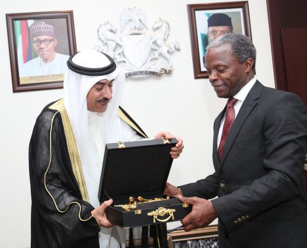Kuwaiti Ambassador to Nigeria, H.E. Dr. Abdulaziz Al-sharrah, presenting a gift to H.E. Vice President Prof. Yemi Osinbajo SAN during a courtesy visit to the Office of the Vice President, Presidential Villa, State House Abuja Fri. 19 Aug 2016
